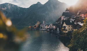 An scenic image of a lake and mountains