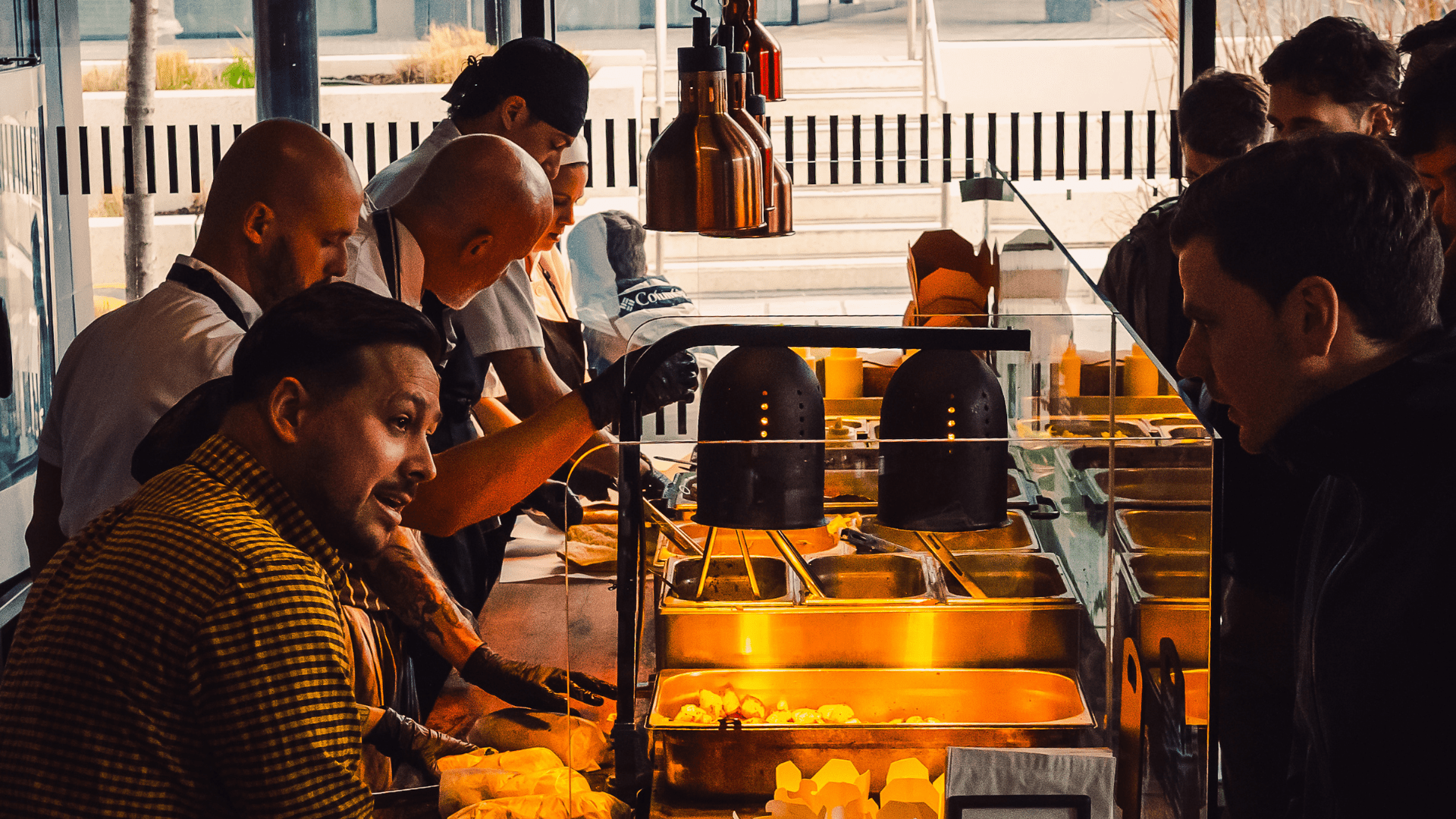 carved-interior Customers eating sandwiches inside Carved Grand Canal Dock in Dublin 2