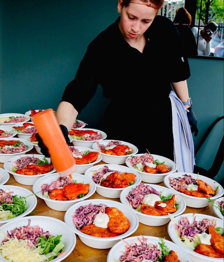 CARVED chef preparing salad bowls for corporate catering in Dublin